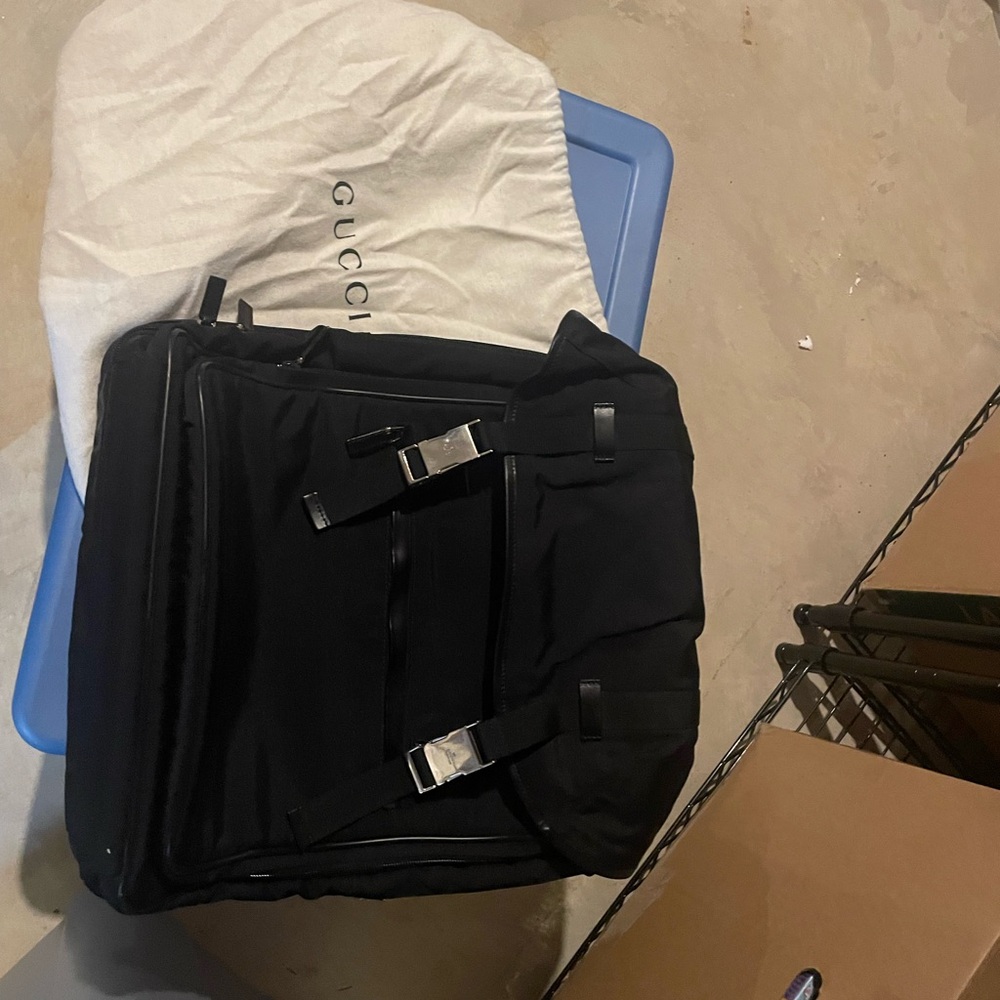 Gucci lap top book bag.